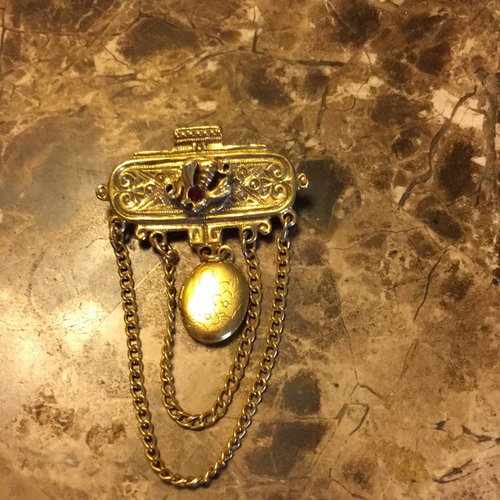 Over 100 year of in with a ruby and a locket